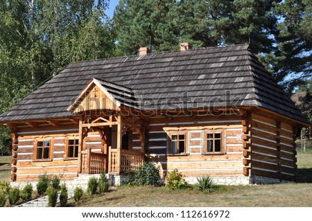 Little wooden cottage in the woods
