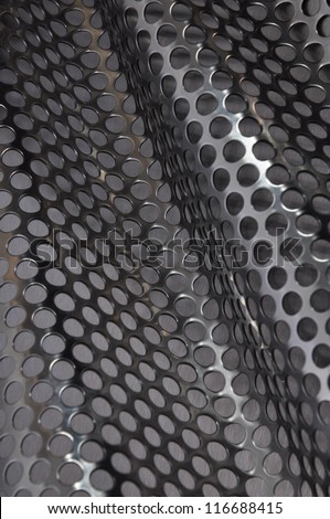 Metal surface with holes