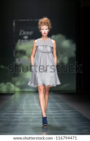 ZAGREB, CROATIA - OCTOBER 10: Fashion model wears clothes made by Marina Design on 'Fashion.hr' show, on October 10, 2012 in Zagreb, Croatia.