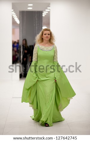 ZAGREB, CROATIA - FEBRUARY 9: Fashion model wears evening gown at \'Wedding expo\' fashion show, on February 9, 2013 in Zagreb, Croatia.
