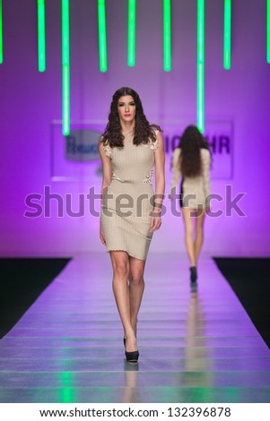 ZAGREB, CROATIA - MARCH 15: Fashion model on catwalk wearing clothes designed by Martina Felja on the \'Fashion.hr\' show on March 15, 2013 in Zagreb, Croatia.