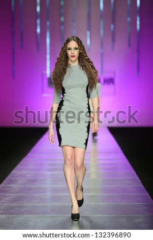 ZAGREB, CROATIA - MARCH 15: Fashion model on catwalk wearing clothes designed by Martina Felja on the \'Fashion.hr\' show on March 15, 2013 in Zagreb, Croatia.