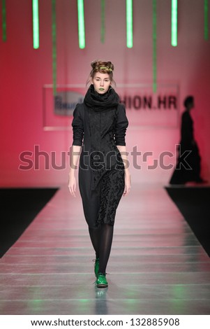 ZAGREB, CROATIA - MARCH 15: Fashion model on catwalk wearing clothes designed by Morana Krklec on the \'Fashion.hr\' show on March 15, 2013 in Zagreb, Croatia.