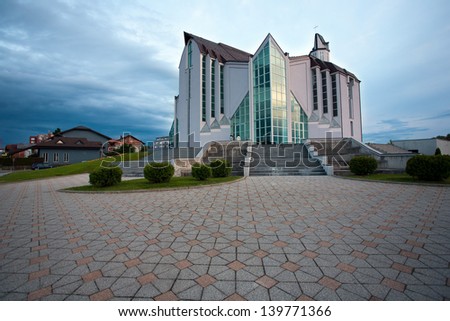 ZAPRESIC, CROATIA - MAY 21: Modern new Zapresic church exterior on May 21, 2013 in Zapresic, Croatia. The church was being built for 20 years and was consecrated on May 26.