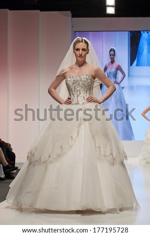 ZAGREB, CROATIA - FEBRUARY 15, 2014: Fashion model in wedding dress on \'Wedding days\' show