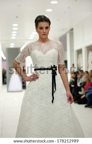ZAGREB, CROATIA - FEBRUARY 22, 2014: Fashion model in wedding dress on \'Wedding expo\' show