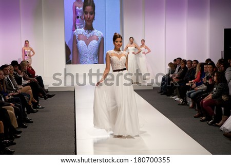 ZAGREB, CROATIA - FEBRUARY 15, 2014: Fashion model in wedding dress on \'Wedding fair\' show