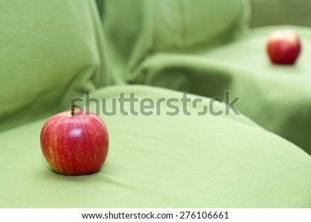Apple on a chair