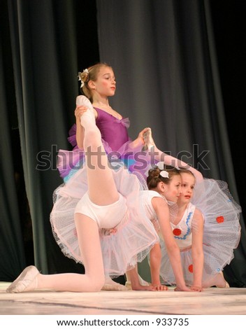 Three young girls dancing on stage