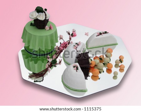 Springtime marzipan food arrangement on pink