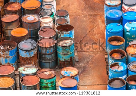Photo of a Chemical waste dump with a lot of barrels