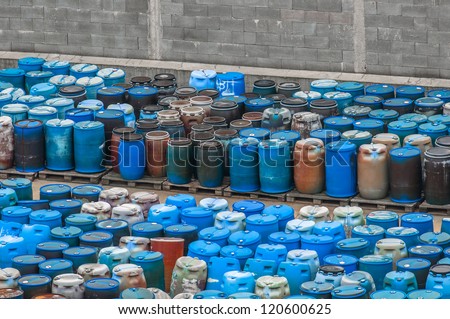 Photo of a Chemical waste dump with a lot of barrels