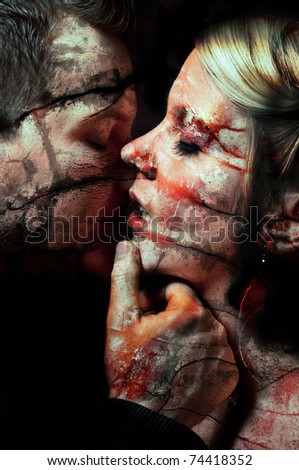 dark art portrait of a young couple kissing