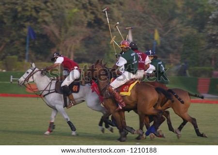 Polo Players vie for the Ball