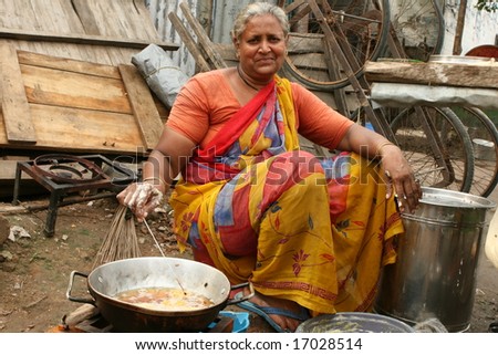 New Delhi, India - July 2008: Woman Cooks Vada (South Indian Cuisine ...