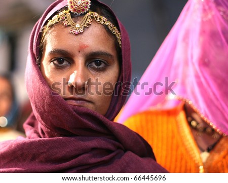 PUSHKAR, INDIA - NOVEMBER 18: A religious pilgrim in Pushkar India on November 18, 2010.  Pushkar, in central Rajasthan, is one of five most sacred religious sites in India for devout Hindus. .