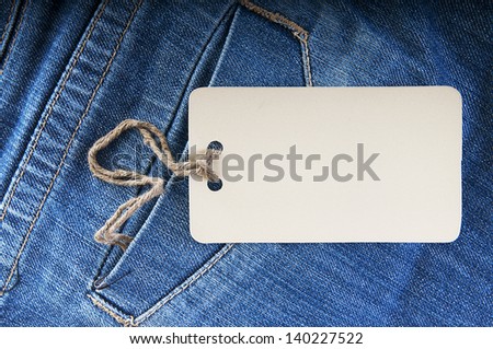 Blue jeans with tag label.