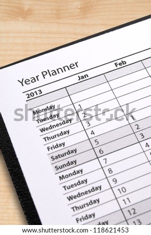 Closeup of an open diary, on the year planner page
