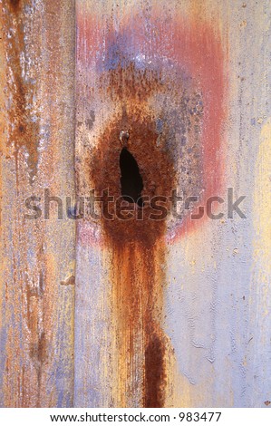 Grunge textured background of rusty sheet metal, looks like burning match