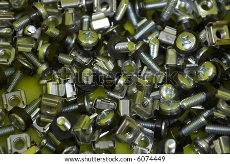 Nuts and bolts used for mounting hardware equipment in a rack