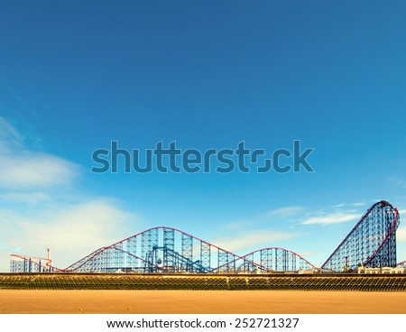 Roller coaster and Blackpool beach