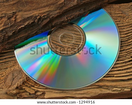 Compact disc on wood