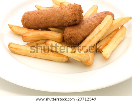 white plate of sausage and chips