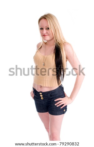 Young Woman Plays Around in Shorts Top and High Heel Shoes