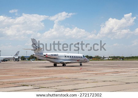 Business jet plane P4-ADD on the ground, Kazakhstan, Almaty International Airport, June, 05, 2011.