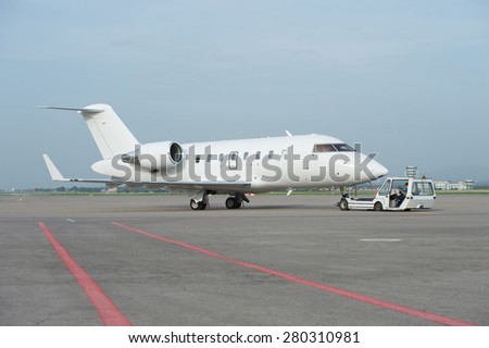 Business jet airplane on the ground