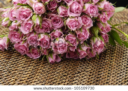 Big Roses Bouquet on woven rattan with natural patterns