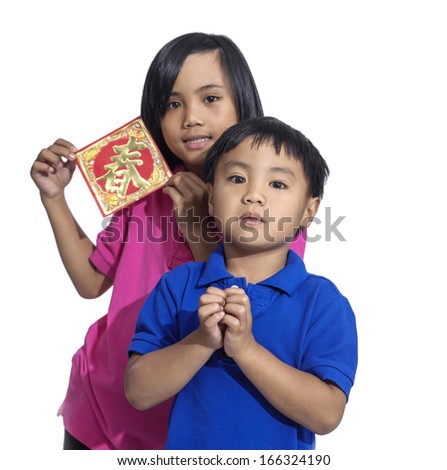 little oriental girl and boy wishing you a happy Chinese New Year