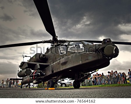 RADOM, POLAND - AUGUST 30: AH-64 Apache military helicopter at static exhibition during Air Show 2009 in Radom, Poland on August 30, 2009