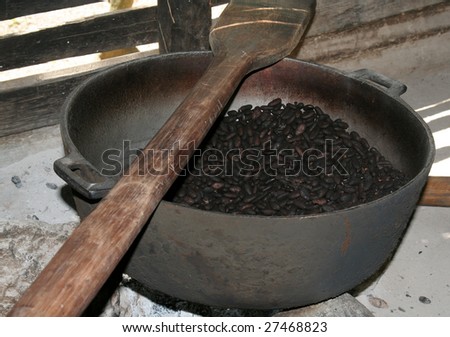 Roasted cocoa beans, still in the pot.