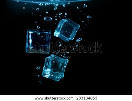 ice cubes under water on black background
