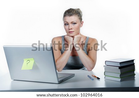 Girl student. Sits at a desktop with the computer.