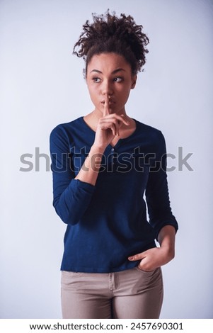 Similar – Image, Stock Photo Ethnic woman showing silence gesture in field