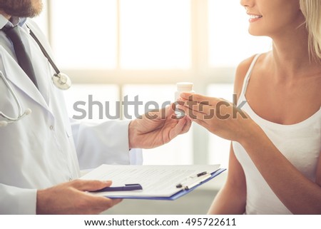 Similar – Image, Stock Photo Crop man giving bone to dog
