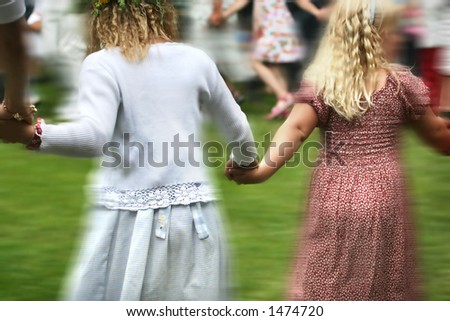 Girls dancing in a circle