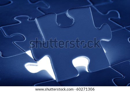 puzzle piece coming down into it\'s place