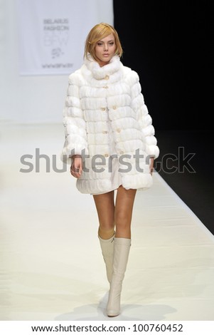 MOSCOW - MARCH 23: A Model walks runway at the O. Jen for Fall Winter 2012 presentation during MBFW on March 23, 2012 in Moscow, Russia