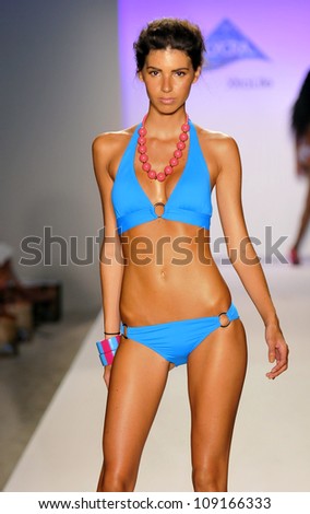 MIAMI - JULY 21: Model walks runway at the XTRA Life Lycra Brand Swimwear Collection for Spring/ Summer 2013 during Mercedes-Benz Swim Fashion Week on July 21, 2012 in Miami, FL
