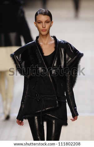PARIS, FRANCE- MARCH 3: A model walks runway during the Barbara Bui Ready to Wear Autumn/Winter 2011/2012 show during Paris Fashion Week at Pavillon Concorde on March 3, 2011 in Paris, France.
