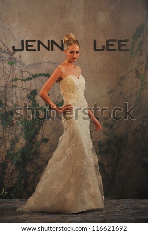 NEW YORK- OCTOBER 14: Models walks runway for Jenny Lee Bridal collection for Fall 2013 during NY Bridal Fashion Week on October 14, 2012 in New York City, NY