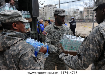 BROOKLYN, NY - NOVEMBER 01: US army helps peoples at the Seagate neighborhood wit Water and food due to impact from Hurricane Sandy in Brooklyn, New York, U.S., on Thursday, November 01, 2012.