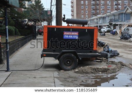 QUEENS, NY - NOVEMBER 11: Damaged homes getting power from generators in the Rockaway area due to impact from Hurricane Sandy in Queens, New York, U.S., on November 11, 2012.