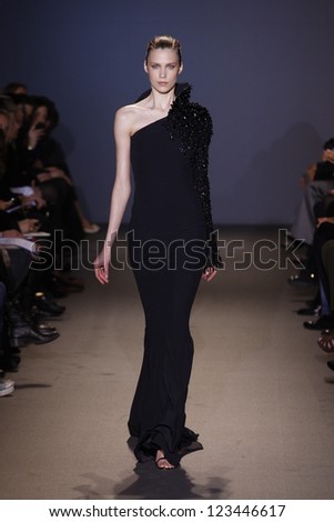 PARIS, FRANCE - MARCH 6: A model walks the runway during the Andrew GN Ready to Wear Autumn/Winter 2011/2012 show during Paris Fashion Week on March 6, 2011 in Paris, France