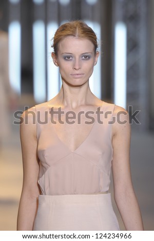 PARIS, FRANCE - MARCH 05: A model walks the runway during the Cacharel Ready to Wear Autumn/Winter 2011/2012 show during Paris Fashion Week at Palais De Tokyo on March 5, 2011 in Paris, France