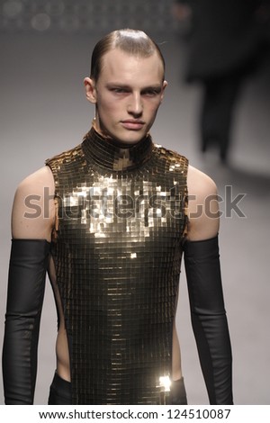 PARIS, FRANCE - MARCH 02: A model walks the runway during the Gareth Pugh Ready to Wear Fall/Winter 2011 show as part of the Paris Fashion Week on March 02, 2011
