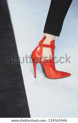 PARIS, FRANCE - MARCH 02: A model shoes on the runway during the Guy Laroche Ready to Wear Fall/Winter 2011 show as part of the Paris Fashion Week on March 02, 2011